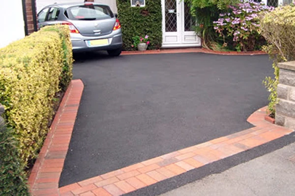 Tarmac frontage with paved edging — JC Style Drives website photograph