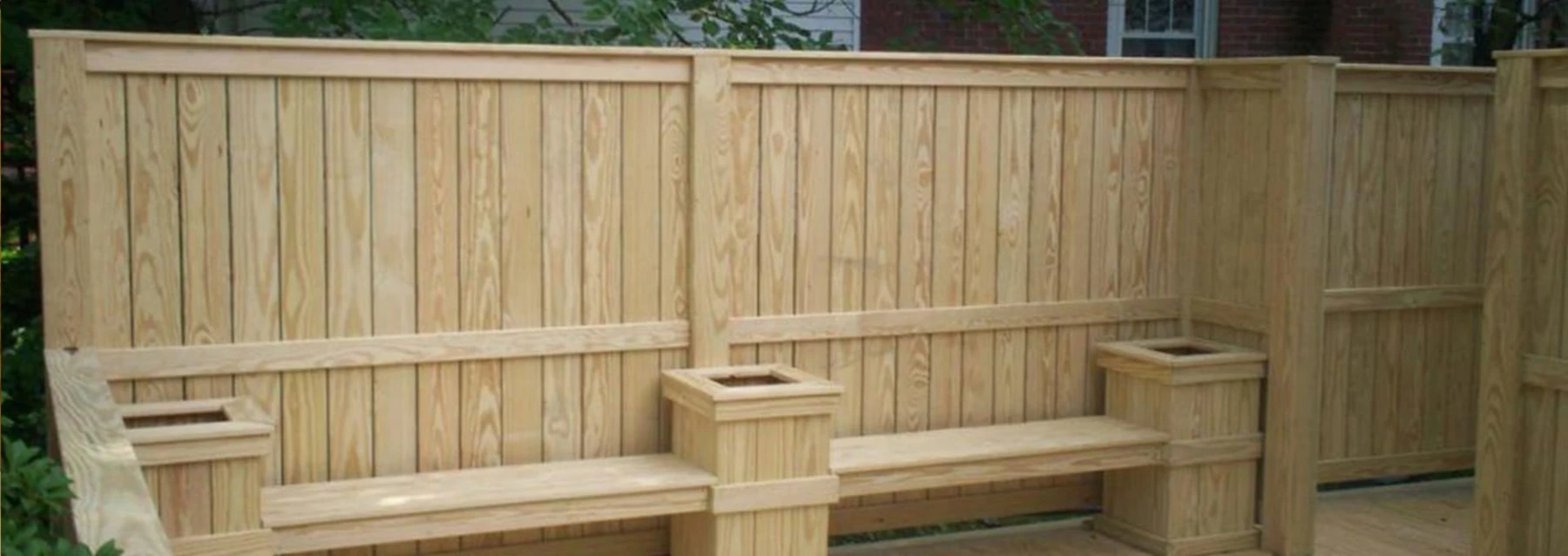 Timber fencing and outdoor seating — JC Style Drives website photograph